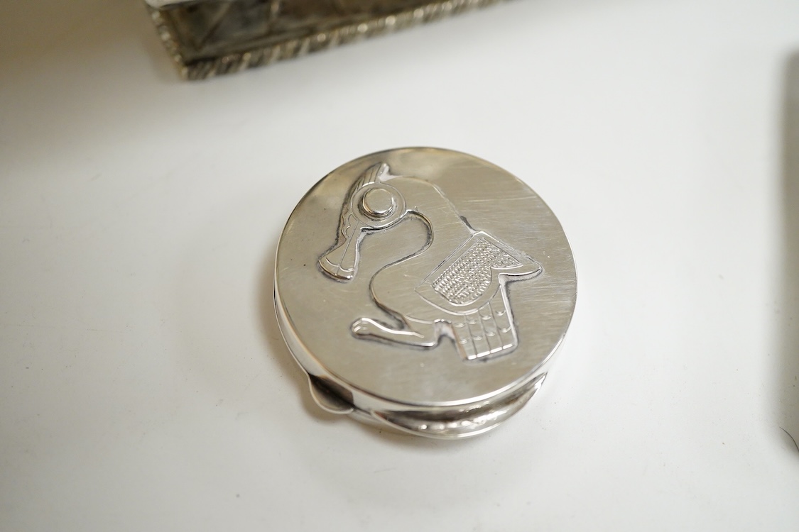 A continental 800 standard oblong shaped dish, of fluted design, together with a Peruvian sterling dish and similar pill box and a George V silver cigarette case, 16.6oz.